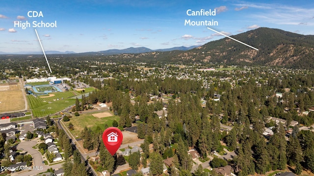 628 E Timber Ln, Coeur Dalene, ID 83815 - aerial view of property's location with a mountainous background