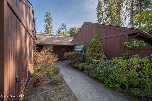 628 E Timber Ln, Coeur Dalene, ID 83815 - view of property exterior featuring a shingled roof