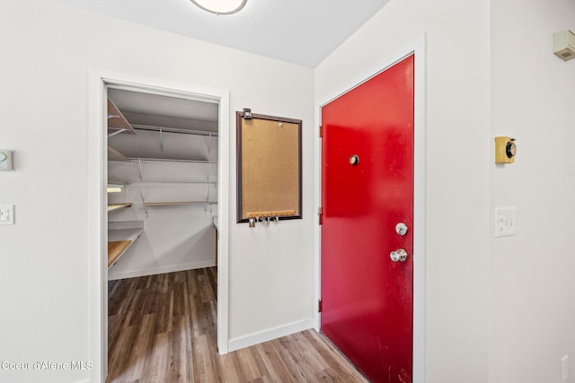 628 E Timber Ln, Coeur Dalene, ID 83815 - hall featuring wood finished floors and baseboards
