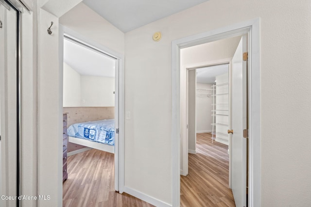628 E Timber Ln, Coeur Dalene, ID 83815 - hall featuring light wood finished floors and baseboards