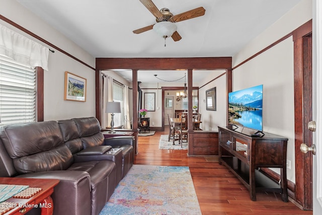 105 E Miller Ave, Coeur Dalene, ID 83814 - living area featuring wood finished floors, a ceiling fan, and a chandelier