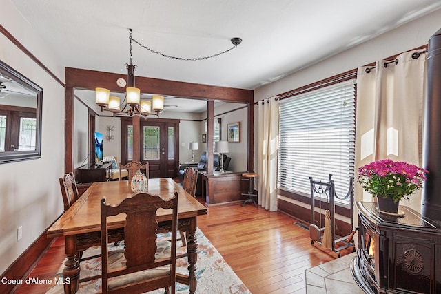 105 E Miller Ave, Coeur Dalene, ID 83814 - dining space with a chandelier and light wood-type flooring