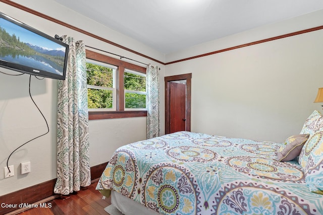 105 E Miller Ave, Coeur Dalene, ID 83814 - bedroom with wood finished floors and baseboards