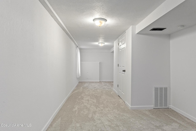 105 E Miller Ave, Coeur Dalene, ID 83814 - corridor with carpet and a textured ceiling