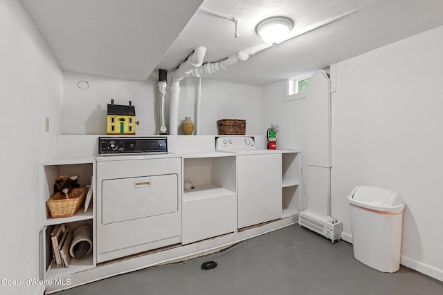 105 E Miller Ave, Coeur Dalene, ID 83814 - laundry area featuring washer and dryer and baseboards