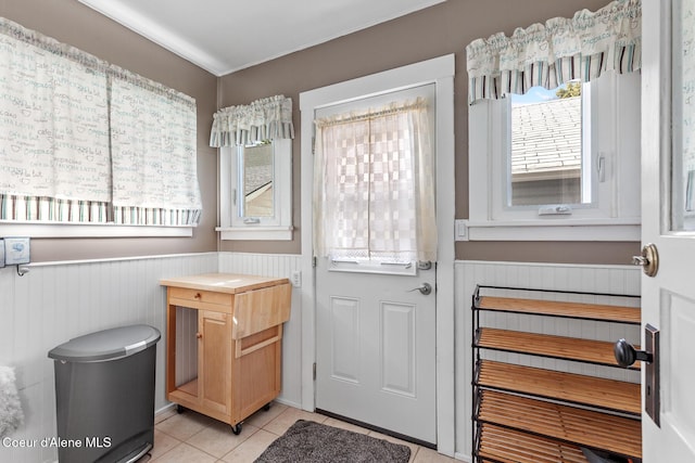 105 E Miller Ave, Coeur Dalene, ID 83814 - doorway featuring light tile patterned floors and wainscoting