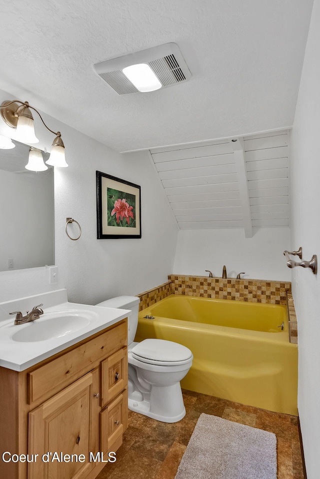 30553 N Stampede Rd, Athol, ID 83801 - bathroom with vanity, a bathtub, and lofted ceiling