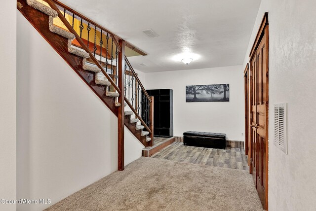 30553 N Stampede Rd, Athol, ID 83801 - corridor featuring stairs and carpet