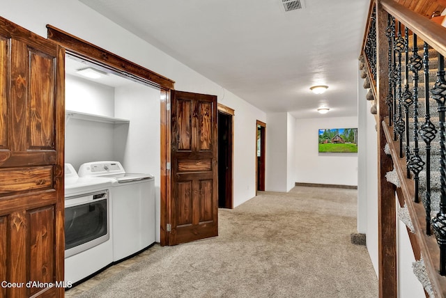 30553 N Stampede Rd, Athol, ID 83801 - laundry room with washer and dryer and light colored carpet