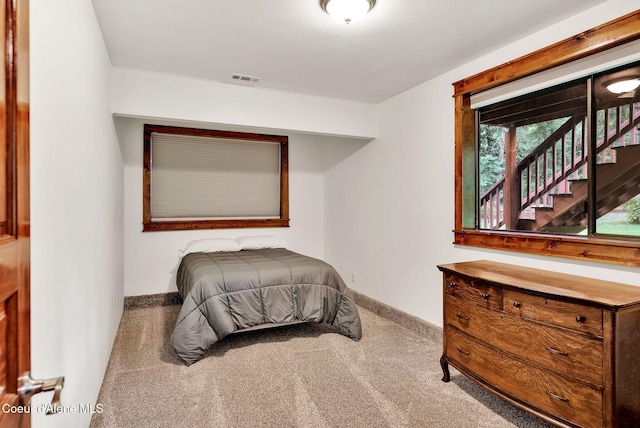 30553 N Stampede Rd, Athol, ID 83801 - carpeted bedroom featuring baseboards