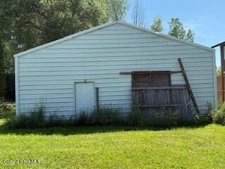 407 Hope St, Kootenai, ID 83840 - view of property exterior featuring a yard