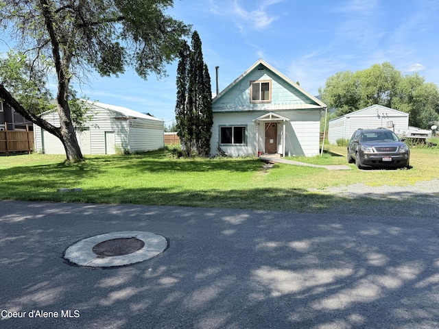 407 Hope St, Kootenai, ID 83840 - bungalow-style home featuring a front yard