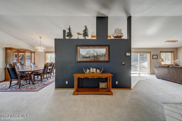 9218 W Rockford Bay Rd, Coeur Dalene, ID 83814 - corridor with carpet, plenty of natural light, a chandelier, and lofted ceiling