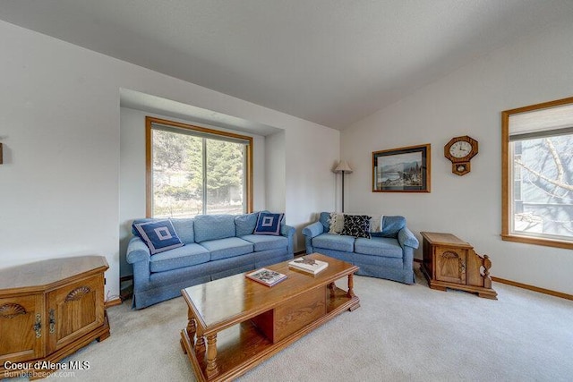 9218 W Rockford Bay Rd, Coeur Dalene, ID 83814 - living area featuring vaulted ceiling and carpet flooring