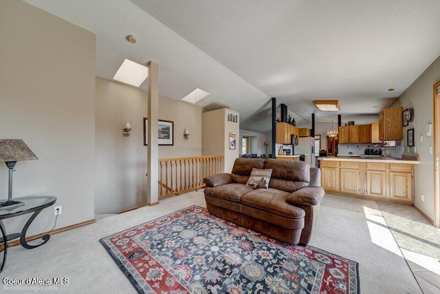 9218 W Rockford Bay Rd, Coeur Dalene, ID 83814 - living area featuring light carpet and vaulted ceiling