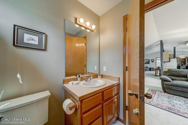 9218 W Rockford Bay Rd, Coeur Dalene, ID 83814 - half bath with lofted ceiling and vanity