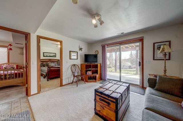 9218 W Rockford Bay Rd, Coeur Dalene, ID 83814 - living area featuring light carpet