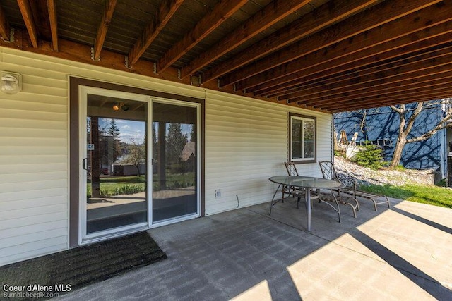 9218 W Rockford Bay Rd, Coeur Dalene, ID 83814 - view of patio / terrace featuring outdoor dining area