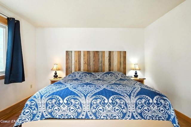 1655 Gun Club Rd, Sagle, ID 83860 - bedroom featuring wood finished floors