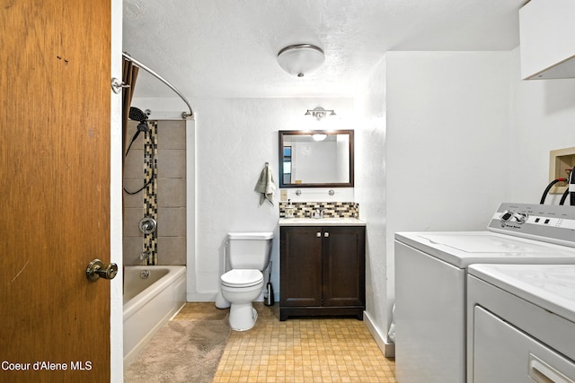 1655 Gun Club Rd, Sagle, ID 83860 - bathroom with independent washer and dryer, vanity, shower / bath combination, a textured ceiling, and tasteful backsplash