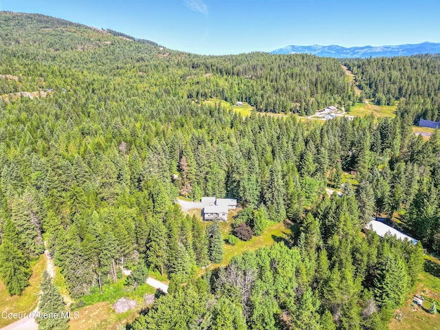 1655 Gun Club Rd, Sagle, ID 83860 - aerial view of property's location featuring a heavily wooded area and mountains