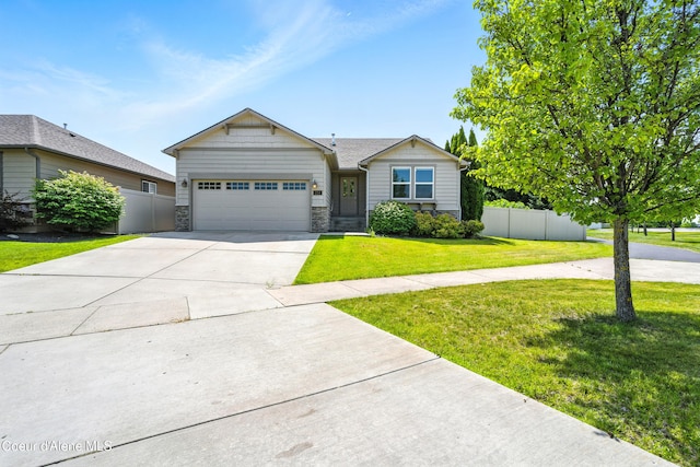 1254 E Bogie Dr, Post Falls, ID 83854 - craftsman inspired home with stone siding, a garage, and concrete driveway