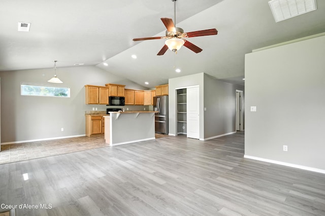 1254 E Bogie Dr, Post Falls, ID 83854 - unfurnished living room featuring lofted ceiling, a ceiling fan, light wood-style flooring, and recessed lighting