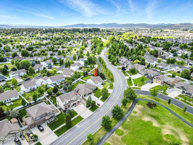 1254 E Bogie Dr, Post Falls, ID 83854 - aerial view of residential area with a mountain backdrop