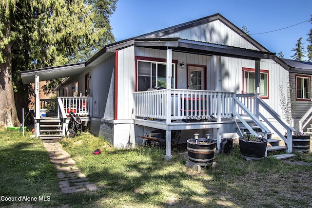 517 N Stephen St, Clark Fork, ID 83811 - rear view of property featuring a porch