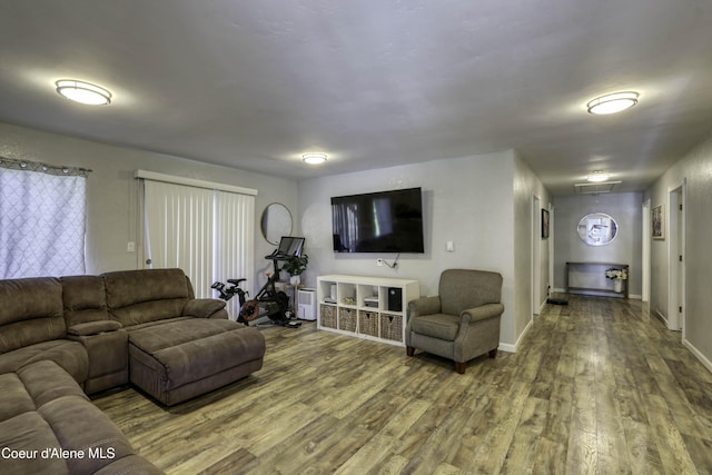 517 N Stephen St, Clark Fork, ID 83811 - living room with wood finished floors and attic access