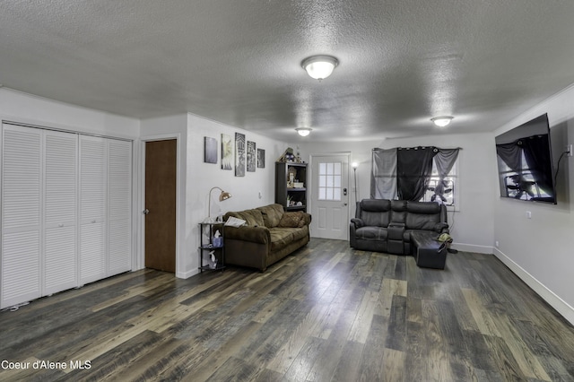 517 N Stephen St, Clark Fork, ID 83811 - living room featuring a textured ceiling and dark wood-style floors