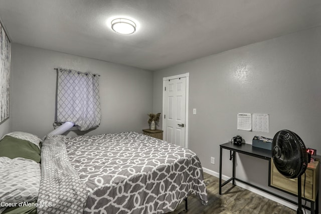517 N Stephen St, Clark Fork, ID 83811 - bedroom with wood finished floors