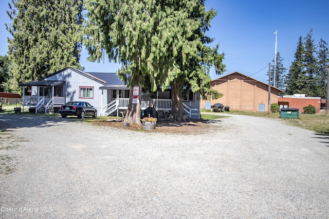 517 N Stephen St, Clark Fork, ID 83811 - manufactured / mobile home with a porch and gravel driveway