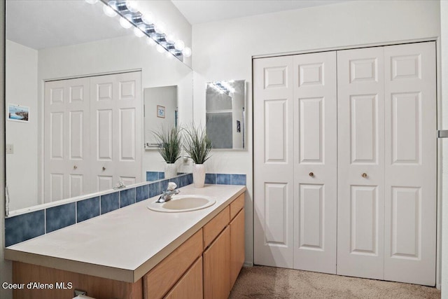 4922 W Village Blvd # 5, Rathdrum, ID 83858 - bathroom featuring a closet and vanity