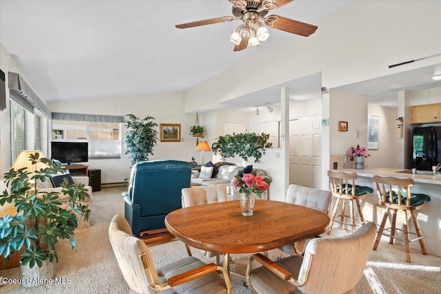 4922 W Village Blvd # 5, Rathdrum, ID 83858 - dining area featuring light colored carpet, a ceiling fan, and lofted ceiling