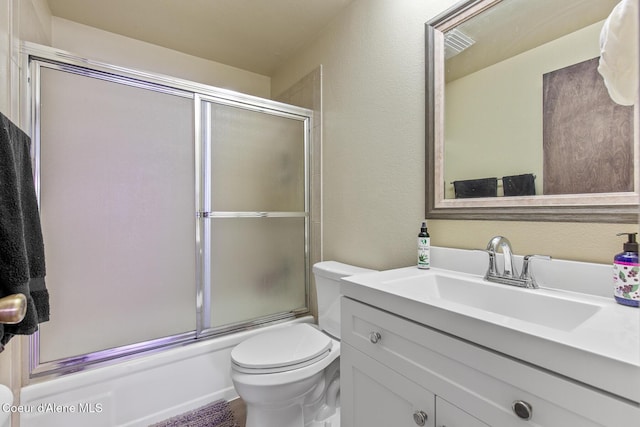 5299 W Green Ct # 23, Rathdrum, ID 83858 - full bath featuring vanity, a textured wall, and shower / bath combination with glass door