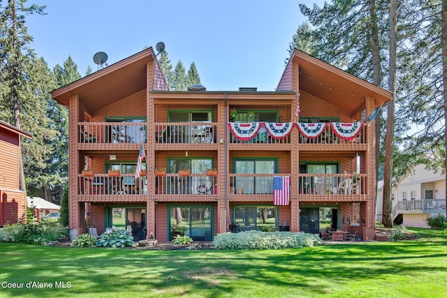 5299 W Green Ct # 23, Rathdrum, ID 83858 - rear view of property with a balcony and a yard
