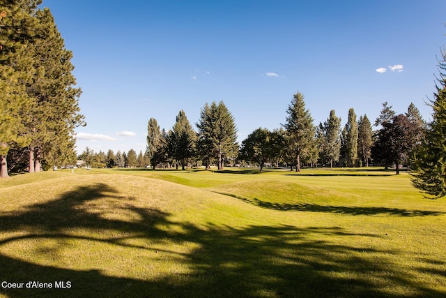 5299 W Green Ct # 23, Rathdrum, ID 83858 - view of property's community featuring golf course view, a lawn, and view of wooded area