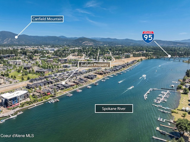 1758 W Bellerive Ln, Coeur Dalene, ID 83814 - drone / aerial view of a water and mountain view