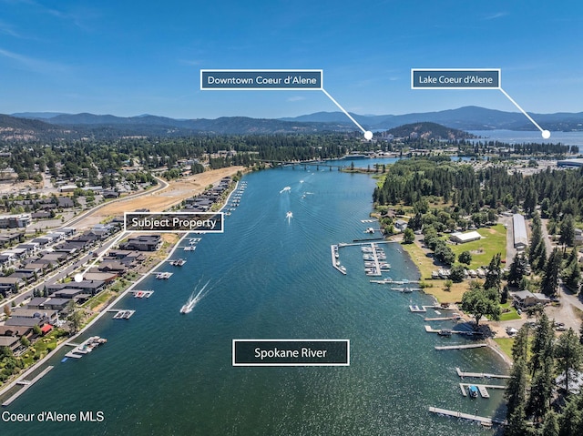 1758 W Bellerive Ln, Coeur Dalene, ID 83814 - drone / aerial view of a water and mountain view