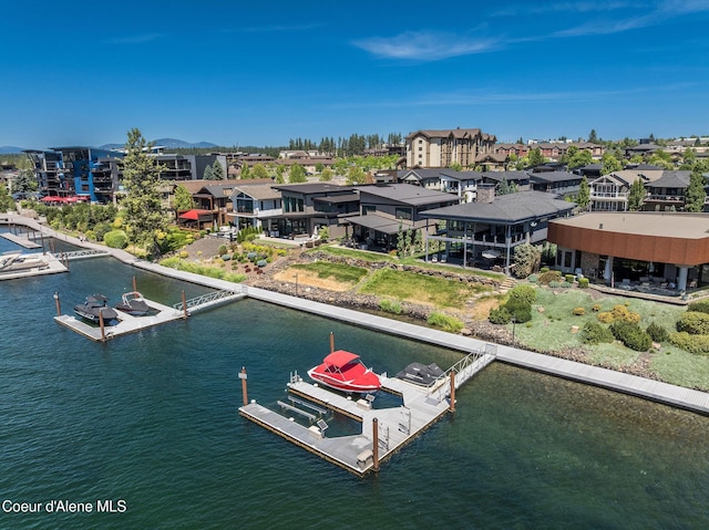 1758 W Bellerive Ln, Coeur Dalene, ID 83814 - aerial perspective of suburban area with a large body of water