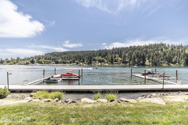 1758 W Bellerive Ln, Coeur Dalene, ID 83814 - dock featuring a view of trees and a water view