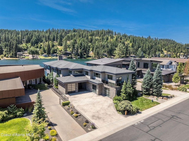1758 W Bellerive Ln, Coeur Dalene, ID 83814 - view of subject property with a forest and a large body of water