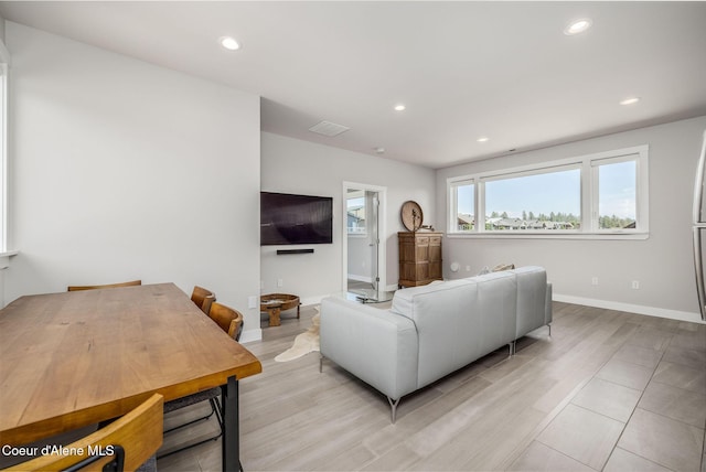 1758 W Bellerive Ln, Coeur Dalene, ID 83814 - living area with recessed lighting and light wood finished floors
