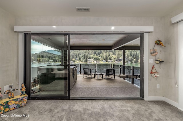 1758 W Bellerive Ln, Coeur Dalene, ID 83814 - doorway to outside featuring baseboards
