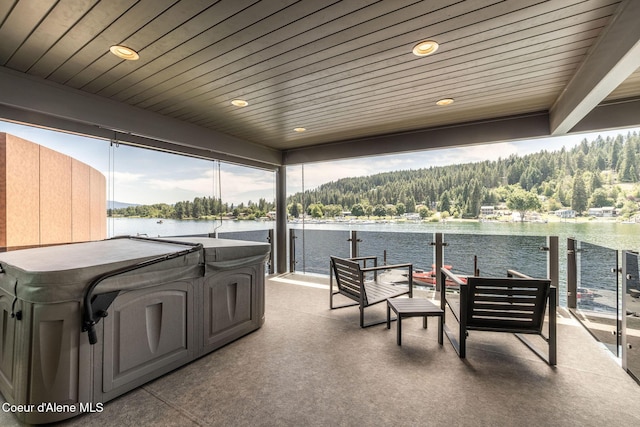1758 W Bellerive Ln, Coeur Dalene, ID 83814 - view of patio with a water view and a forest view
