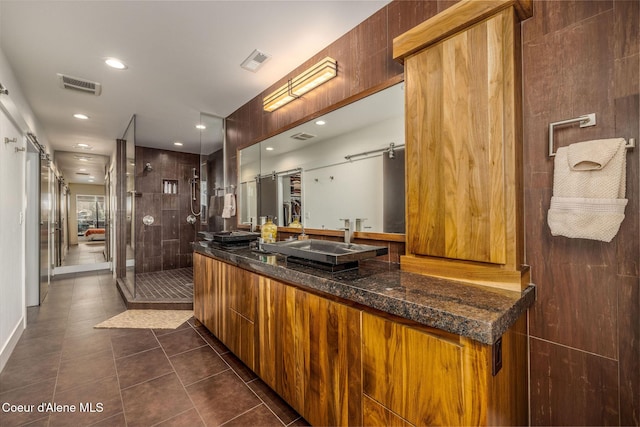 1758 W Bellerive Ln, Coeur Dalene, ID 83814 - full bath with vanity, a shower stall, tile patterned floors, and recessed lighting