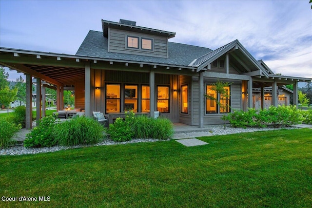 428 W Beach Ct, Dover, ID 83825 - back of house with a yard and a shingled roof
