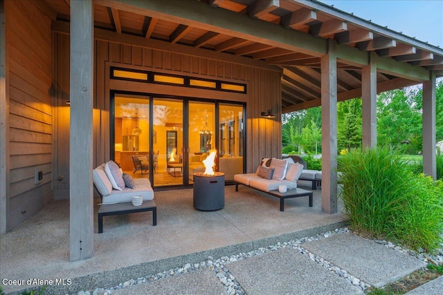 428 W Beach Ct, Dover, ID 83825 - view of patio with a fire pit