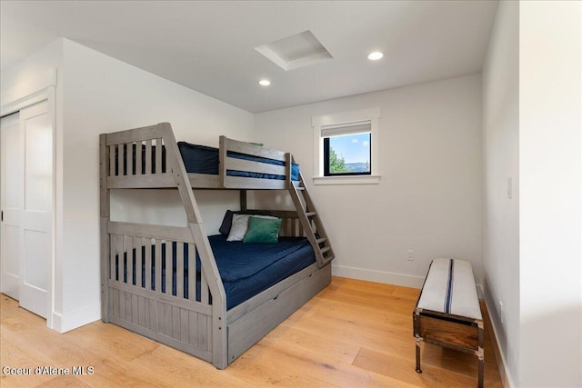 428 W Beach Ct, Dover, ID 83825 - bedroom with wood finished floors and recessed lighting